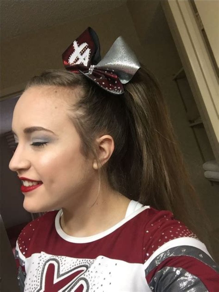Cheer makeup and hair bold grey red Cheer ponytail, Cheer makeup
